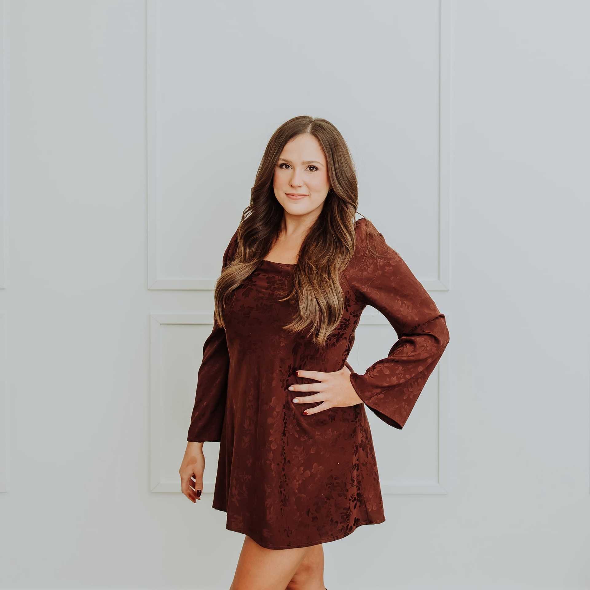 Portrait of Shannon, a professional stylist at Bombshell Salon & Spa, showcasing their expertise and style.